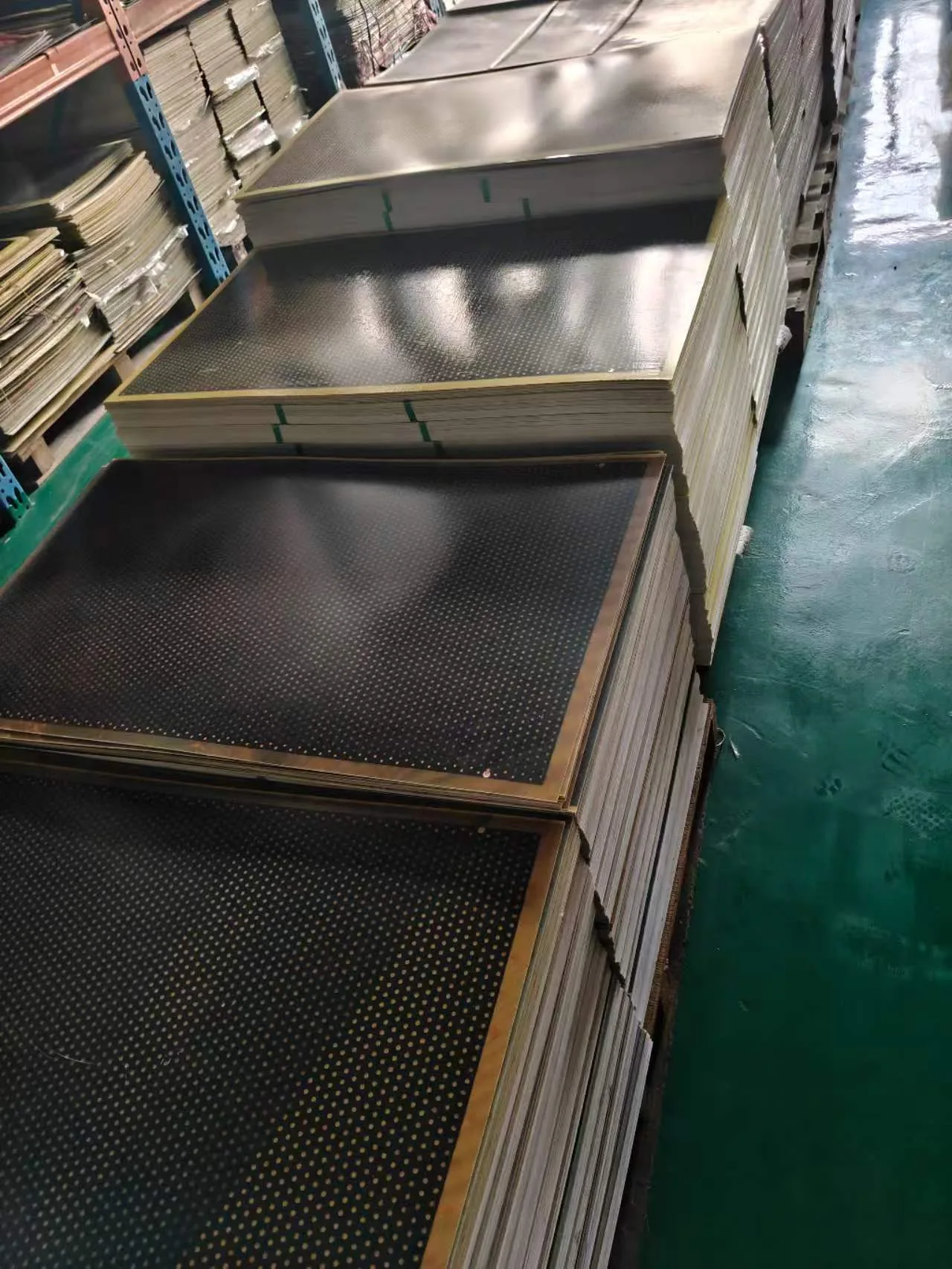 Stacked graphene far-infrared heating panels in factory storage